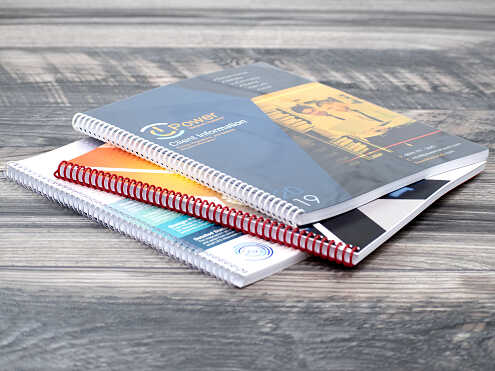 Coil bound books with plastic covers